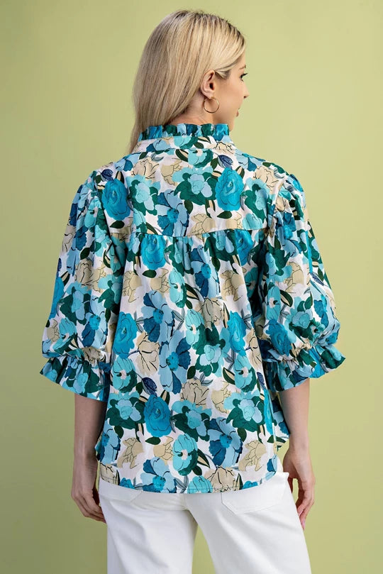 Turquoise floral blouse