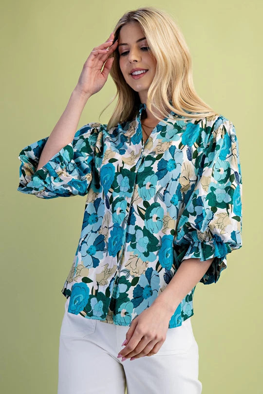 Turquoise floral blouse