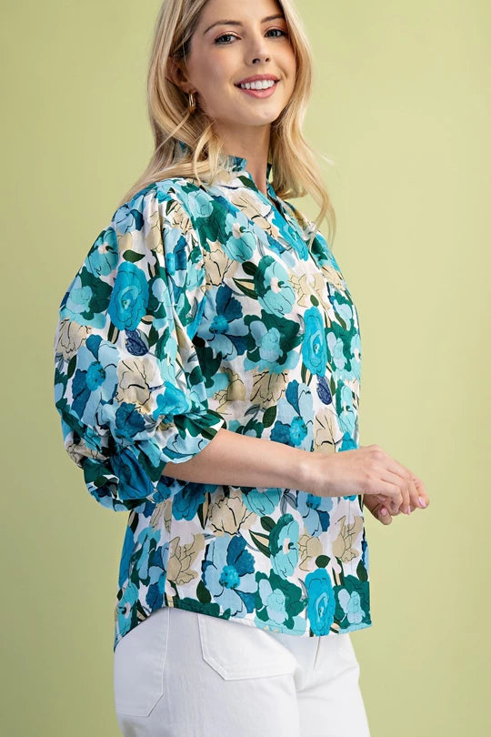 Turquoise floral blouse