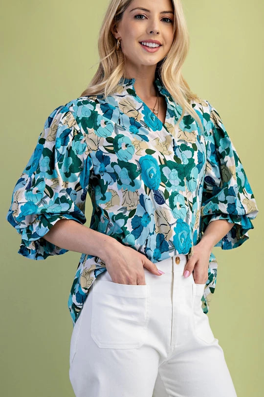 Turquoise floral blouse
