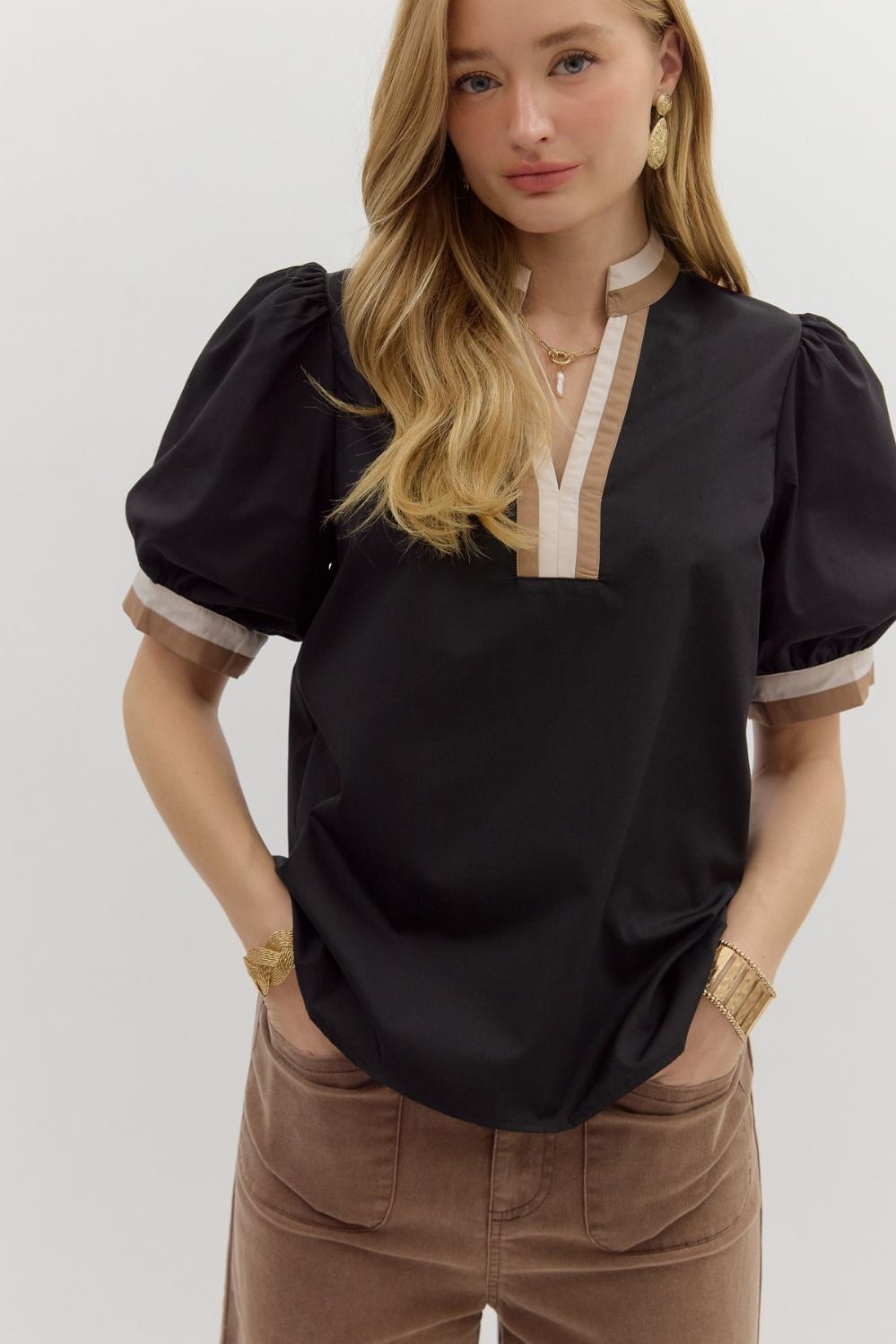 Black top with neutral trim
