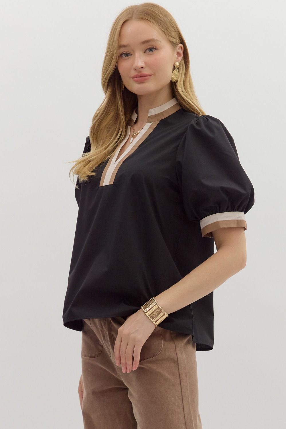 Black top with neutral trim