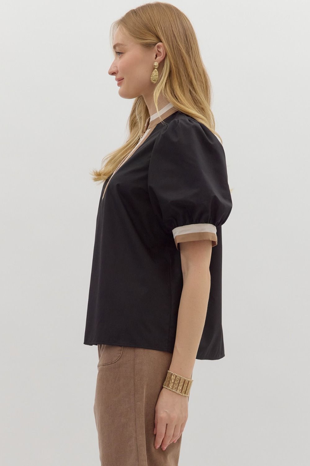 Black top with neutral trim
