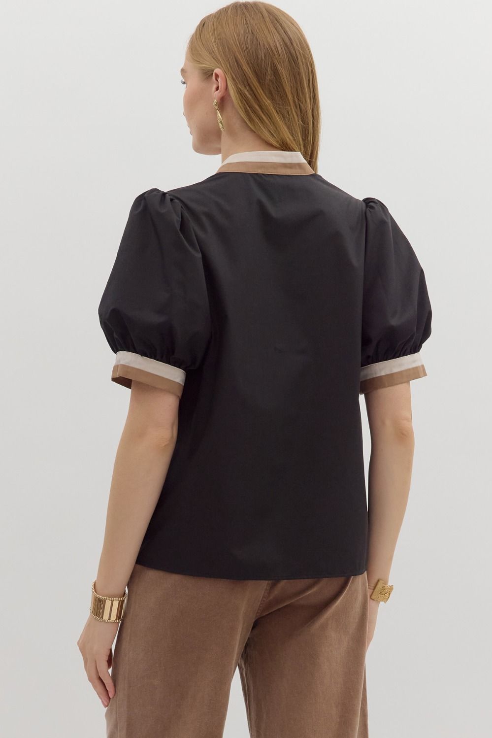 Black top with neutral trim