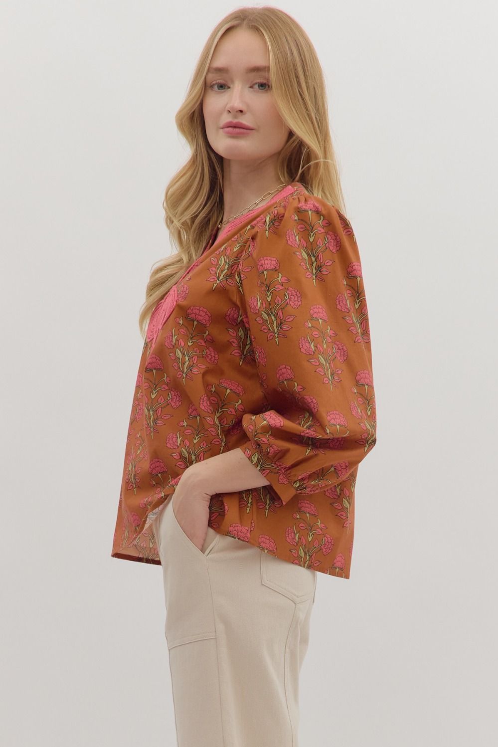 Knot trimmed rust top