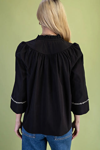 Gigio black ruffled neck top