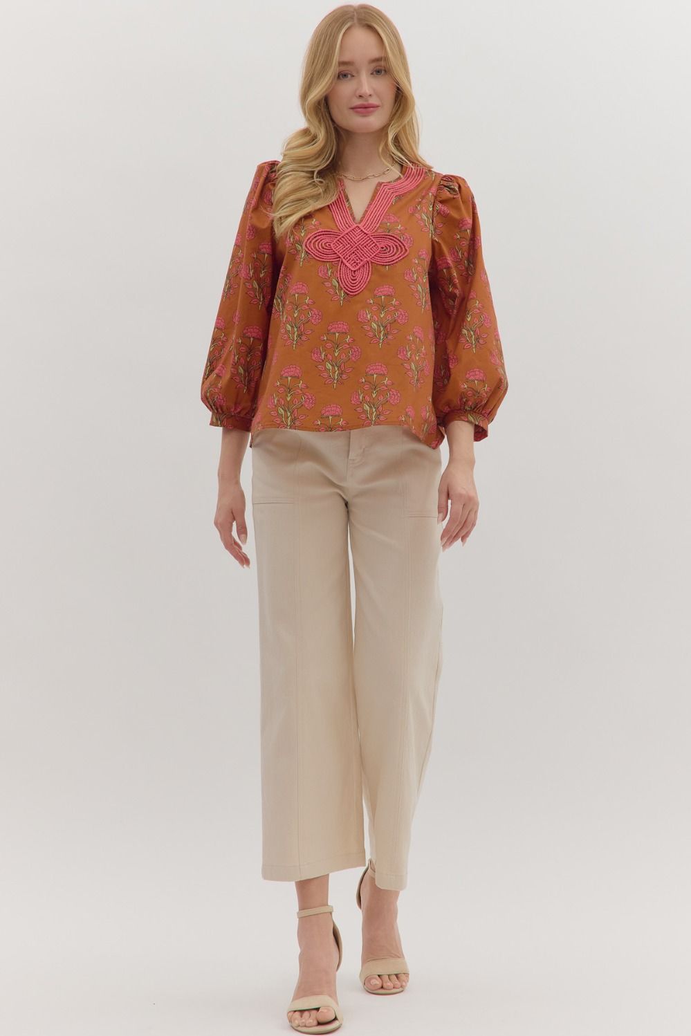 Knot trimmed rust top