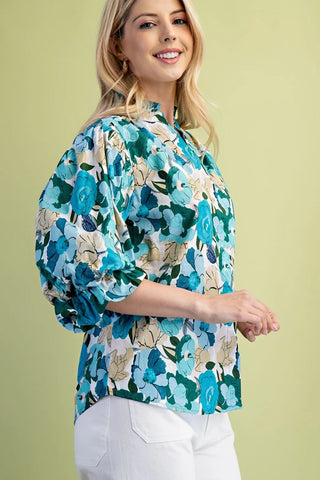 Turquoise floral blouse