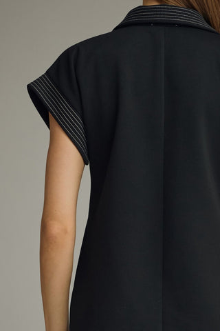 Black knit dress with short sleeves and top stitched detail