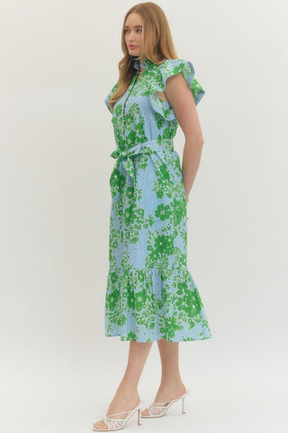 Woman wearing a floral dress with a white background