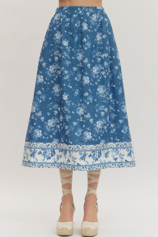 Entro blue and white floral midi skirt on a plain background