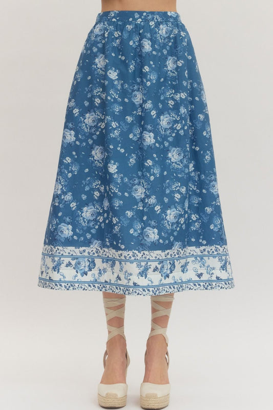 Entro blue and white floral midi skirt on a plain background