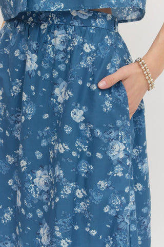 Entro blue and white floral print skirt with hand in side pocket