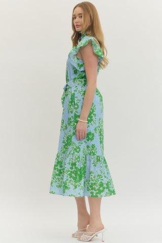Woman wearing a floral dress on a white background