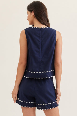 Navy blue sleeveless top and shorts linen blend set with white trim by Entro rear view