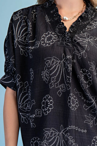 Black blouse with white floral patterns from Gigio style #Te1999