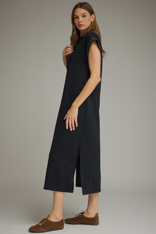 Side view of an Entro black knit.sleeveless midi dress