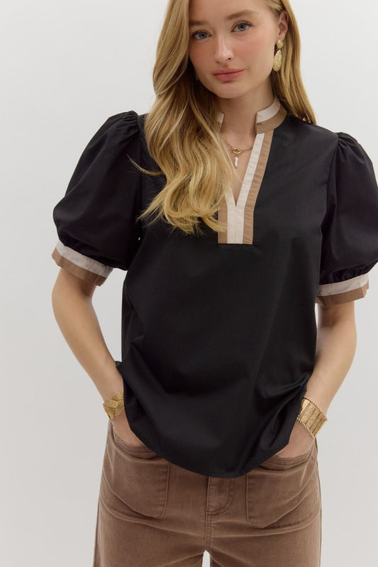 Black top with neutral trim