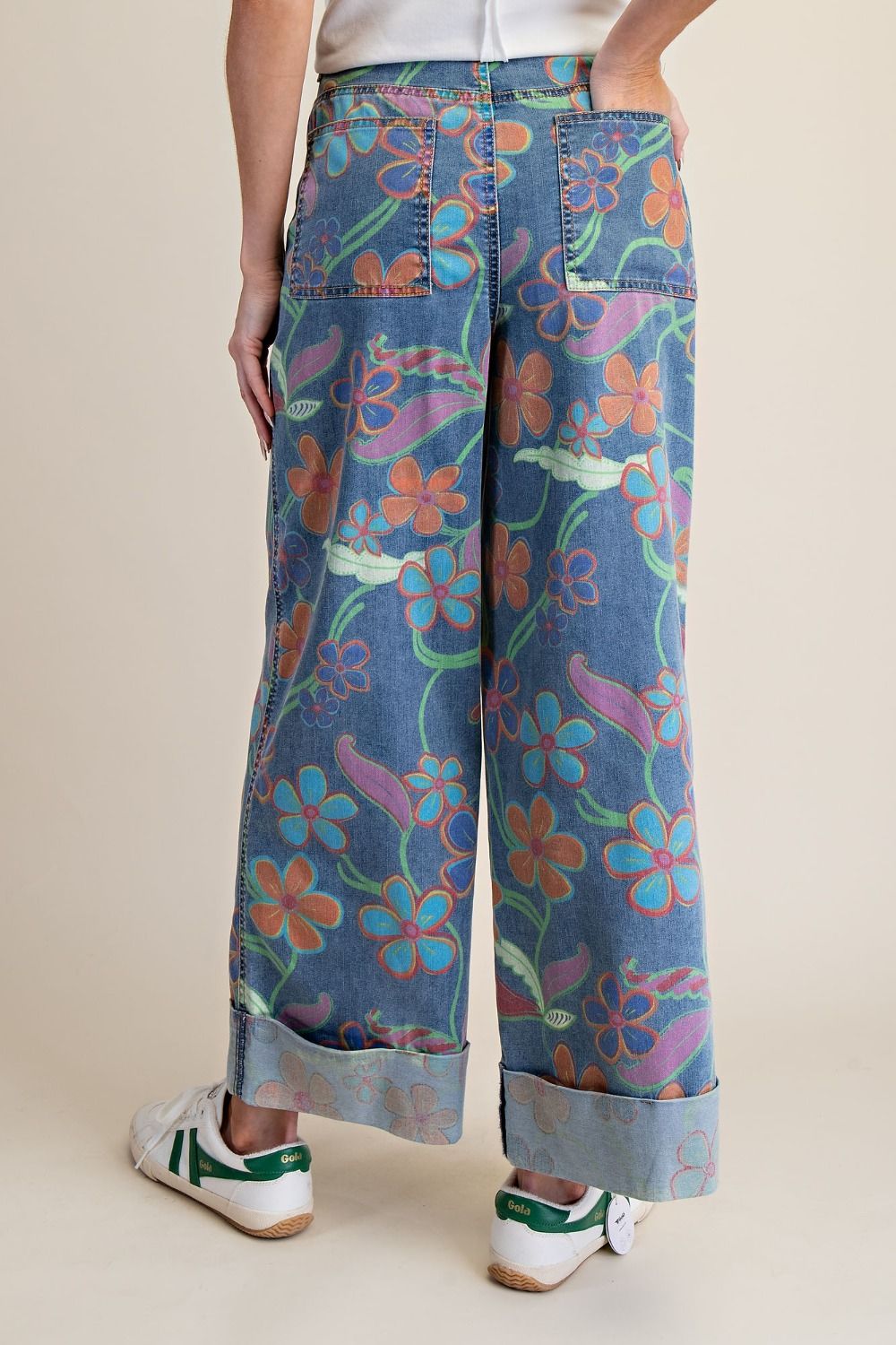 Rear view of Easel colorful floral print wide leg cuffed denim